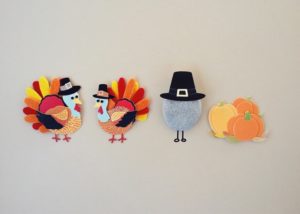 felt turkeys dressed up like pilgrims 